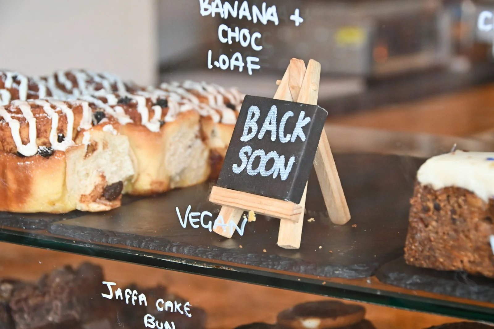 TNS : a group of pastries on a black surface